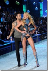 Adam Levine of Maroon 5 performs with model-Anne Vyalitsina